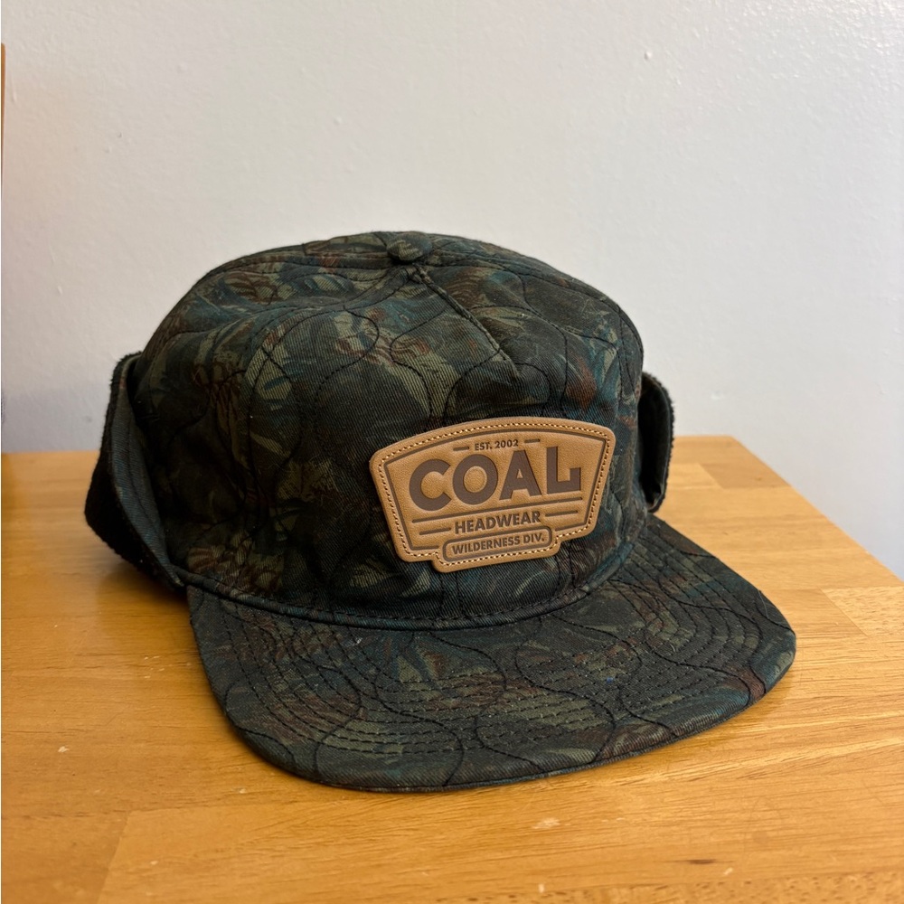 Coal The Cummins quilted earflap cap in a camouflage pattern